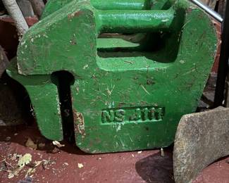 John Deere Front Suitcase Quik-Tatch Weight. Provides counterbalance for tractors when using rear implements. Great piece to have and fits a variety of John Deere compact tractor models.