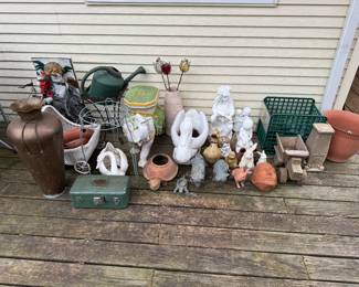Collection of lawn decorations and planters. Cute figures and various designs to enhance your outdoor spaces.