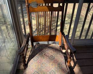 Antique Victorian Glider Rocker Chair. Upholstered padded seat. Beautifully designed chair and great to relax in.
