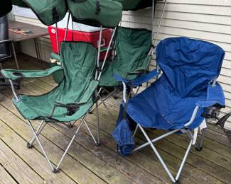 Folding Camping Chairs designed for outdoor use. All are foldable with carrying cases and made from durable and weather-resistant materials. Green chairs have a really nice built-in canopy for sunshade.