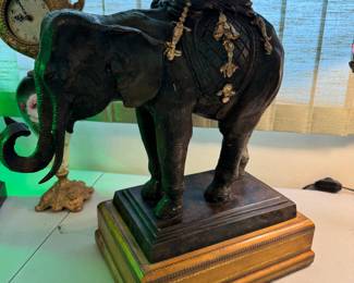 Maitland Smith Bronze Elephant Occasional Table. Bronze elephant supporting a square metal frame with glass top. Hollywood Regency style from the 1970s. Rare find-produced in limited quantities. Excellent condition.