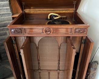 Victor Victrola cabinet showing speaker and side storage for vinyl records etc.