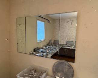Multi-panel wall mirror, functional and decorative. Reflects light to brighten and enlarge space. Beautiful decor and a wonderful addition to any space.