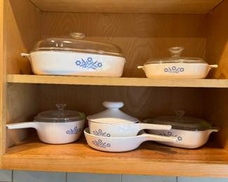 Collection of Blue Cornflower CorningWare casserole dishes known for durability and versatility-may be used on stovetop, in the oven, and is dishwasher safe and withstands high temperatures. Produced from 1957 to 1988.