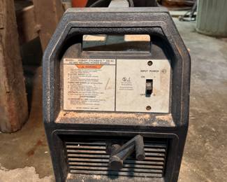 Hobart Handler Wire Feed Welder. Welds up to 3/8 inch of mild steel, both flux-cored and MIG welding. Versatile and can operate on 115V or 230V input power.