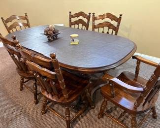. . . pine dining table and chairs with protective pads