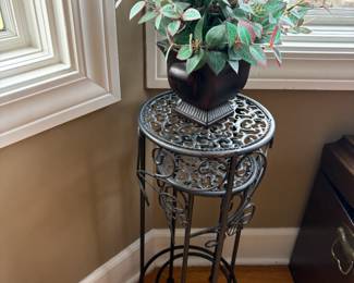 . . . great wrought-iron plant stand