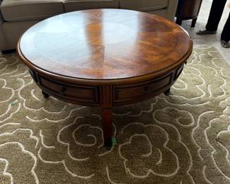 . . . round coffee table w/drawers