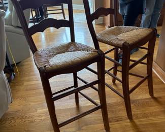 . . . two of three rattan bar stools