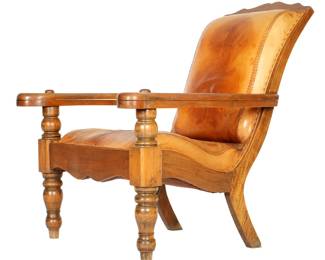 Lot 214: Anglo Indian Teak and Leather Plantation Chair