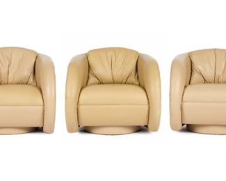 Lot 154: Three Preview Furniture Leather Swivel Club Chairs