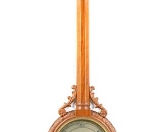 Lot 257: CK Cape Town Carved Walnut Wheel Barometer