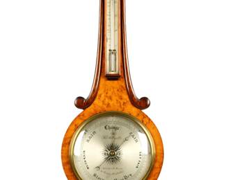 Lot 259: Rubergall London Mixed Wood Wheel Barometer