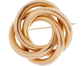 Lot 137: 14k Gold Swirl Knot Brooch