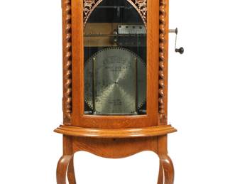 Lot 40: Regina Oak Corona Style 35 Upright Disc Music Box