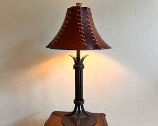 $75 - Heavy lamp with leather shade 32”H