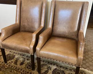 2 Heavy leather chairs - show scratches
$50 each