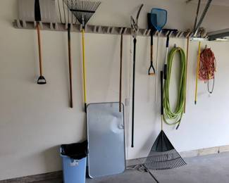 Various Gardening Tools And Extension Cord And Auto Drip Pan