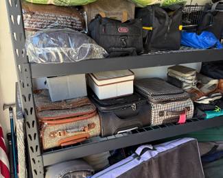 shelving, suitcases, travel bags, camping supplies, pillows