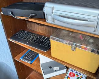keyboard, sewing supplies, calculator, toy, etc