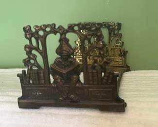 Collapsible Brasscolored Castiron Bookshelf
