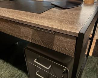 Only 1 year old - Large, modern writing desk - Sleek shape and timeless look - Black iron base - Keyboard tray - 3 Drawers with soft-close - Finished back - Functional and good looking - Solid Hardwood, Brown - Fits multiple monitors
- No flaws or scuffs, in perfect condition
Measurements = 30” tall 62” wide 30” deep - $450 + tax.