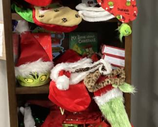 CABINET FULL OF DR. SEUSS CHRISTMAS GRINCH COLLECTIBLES, STOCKINGS, HATS, GRINCH BOOKS