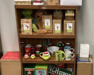 CABINET FULL OF DR. SEUSS CHRISTMAS GRINCH COLLECTIBLES, PLACE MATS, CLOTHING, JIM SHORE ORNAMENTS, GLASSWARE, FIGURINES, PLATES