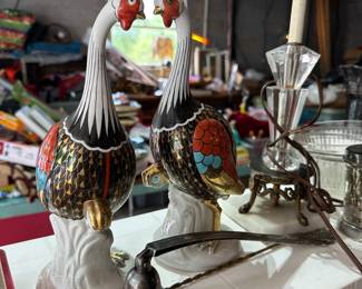 Pottery birds, candle snuffers, glass lamp