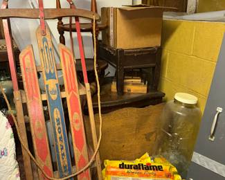 Large vintage sled. Compressed wood logs, large jar and more