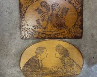 Wood burned renditions of Gibson Girls