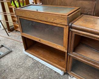 Assorted stackable sections for barrister bookshelves—none are complete