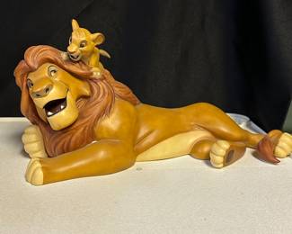 Collection mostly 90s WDCC (Walt Disney Classic Collectibles) porcelain figurines—assorted sizes and prices.