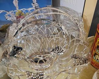 set of silver baskets