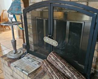 fireplace screen and pillow logs