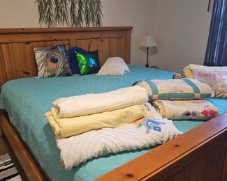 cozy king-size bed with quilts