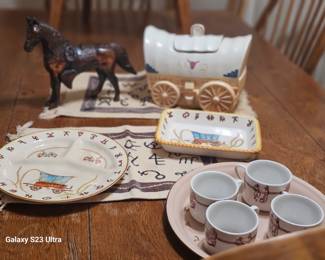 cowboy dishes and cups, horse is metal, wagon is a cookie jar, all sold separately except cups
