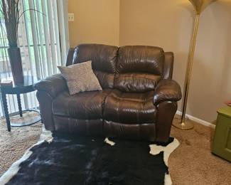 leather loveseat with cow hide a comfortable spot to relax for your home