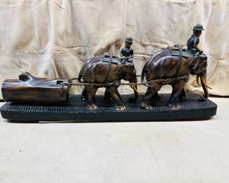 Burmese Teak Wood Sculpture depicting two elephants pulling a log.
Gorgeous piece - one hairline crack
Signed Chiang Mai