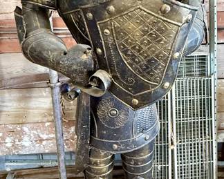 This unique and interesting suit of armor is 80 inches tall x 30 inches wide x 21 inches deep.