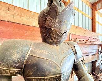 This unique and interesting suit of armor is 80 inches tall x 30 inches wide x 21 inches deep.