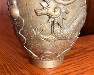 Antique Chinese Dragon Pot
Brass with two dragons.
Pot is very heavy "8 1/2" tall.
There is one very old repair please see pictures.