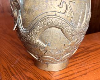 Antique Chinese Dragon Pot
Brass with two dragons.
Pot is very heavy "8 1/2" tall.
There is one very old repair please see pictures.