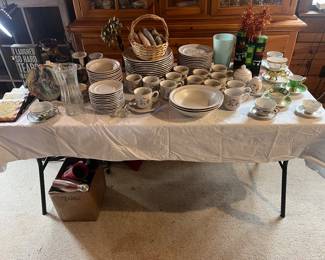 stoneware dishes , tea cups, etc