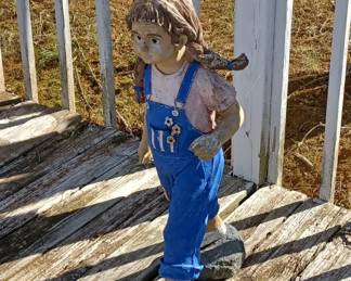 Vintage outdoor girl garden statue