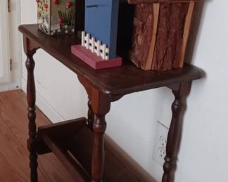 Vintage side table and birdhouses