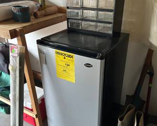 Brand new Sanyo bar refrigerator.