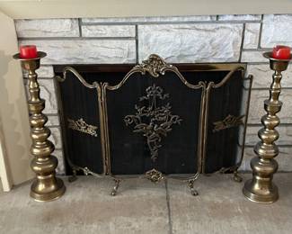 Ornate fireplace screen.