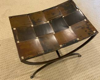 Woven metal bench