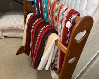 Cute wooden quilt rack!